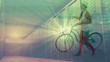 walking bicycle on beach, person with animation of geometric patterns overlay