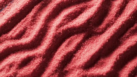 video of close up of red coloured sand with pattern and copy space background