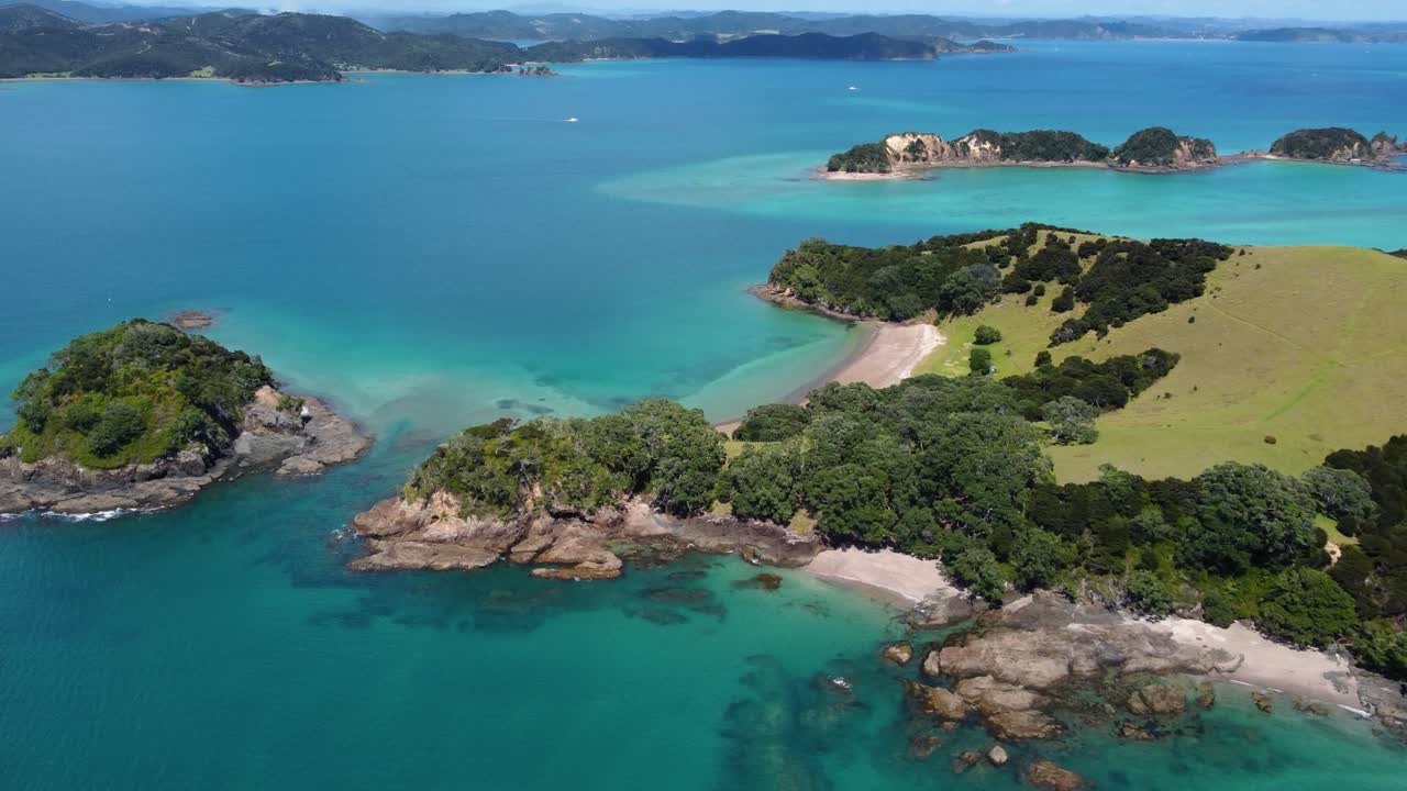 AERIAL Side Panning Shot of Beautiful Beaches in Bay of Islands, New Zealand