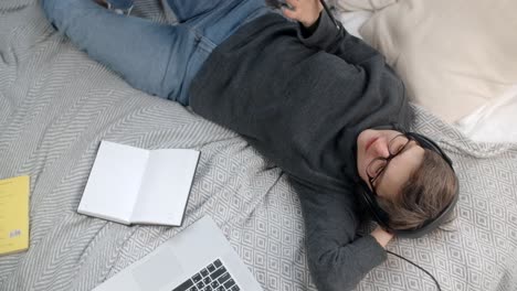 student relaxing at home