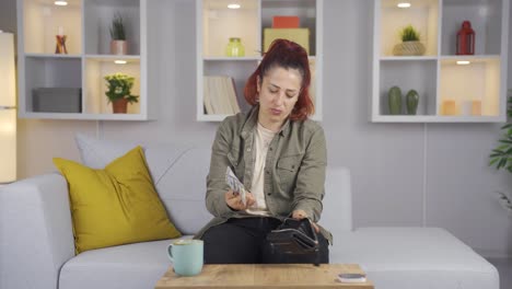 desperate woman with little money, thoughtful.