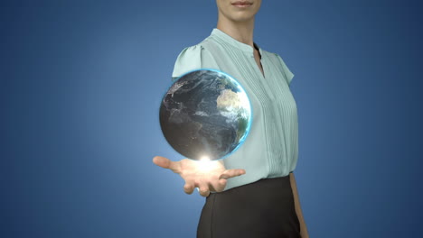 businesswoman holding digital generated globe