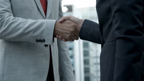 slow motion shot of business people meeting on street