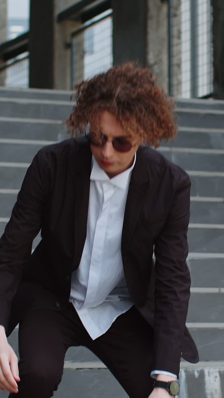 Upset businessman extremely upset holding reports of company work worried about future business