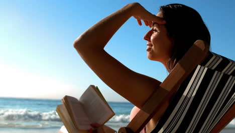 woman sitting in a sunchair