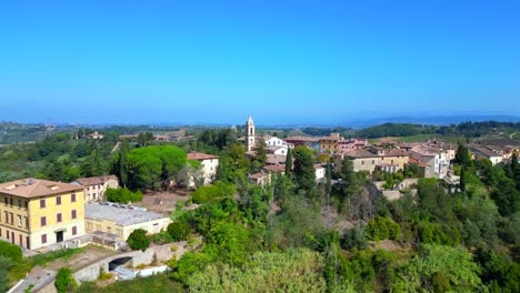 fantastic aerial top view flight tuscany medieval village mediterranean wine growing region panorama orbit drone