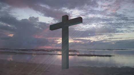 animación de luces brillantes sobre el crucifijo y el paisaje marino