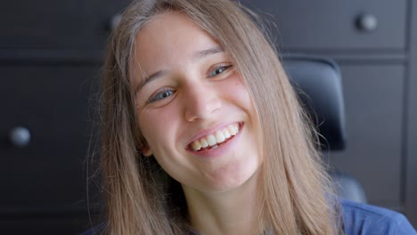 portrait of happy smiling woman, close up front view