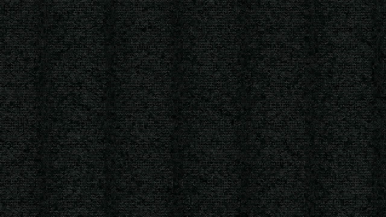 Pozadí s texturou tmavě černé látky.