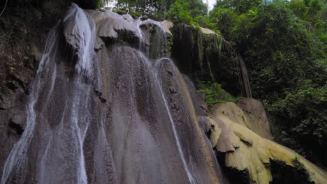 stunning waterfall in lush tropical forest