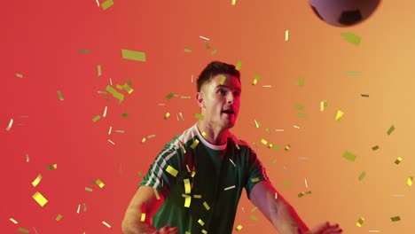 animation of caucasian male soccer player over confetti