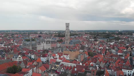fiery colored rooftops in the town of bruges, aerial shot hd, cities of europe