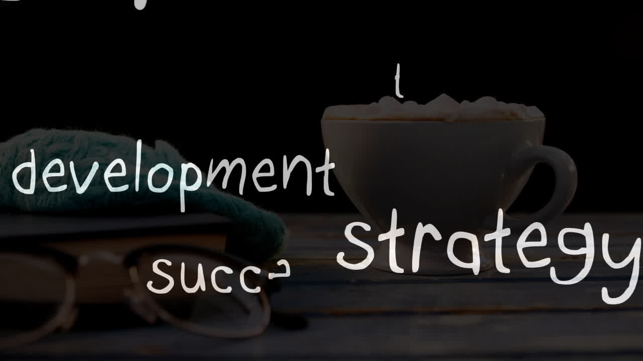 Coffee cup on table showing animation with words development and strategy