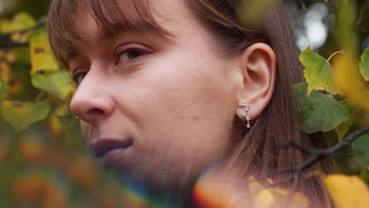 closeup portrait of artistic hipster alternative girl, stylish caucasian young woman,  background and colorful shot, prismatic lens flare refraction.
