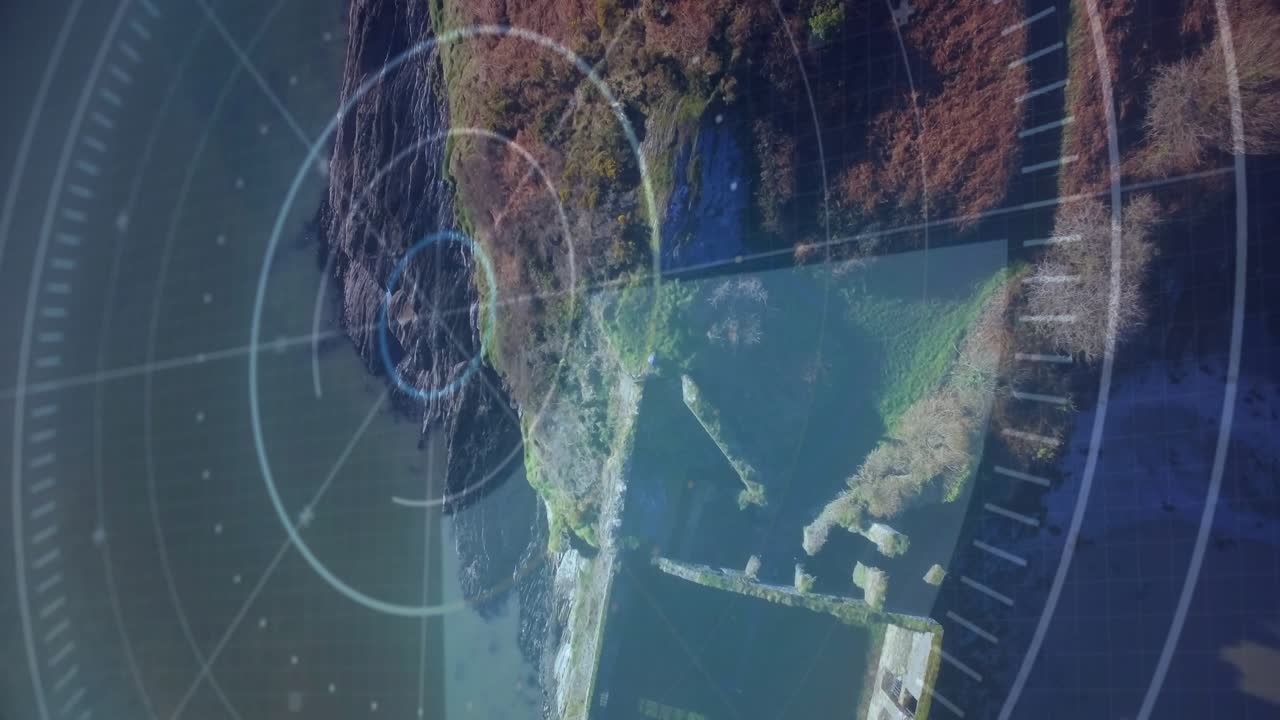 HUD overlay initiating rotating sweep, scanning coastal headland and pier for surveillance mapping