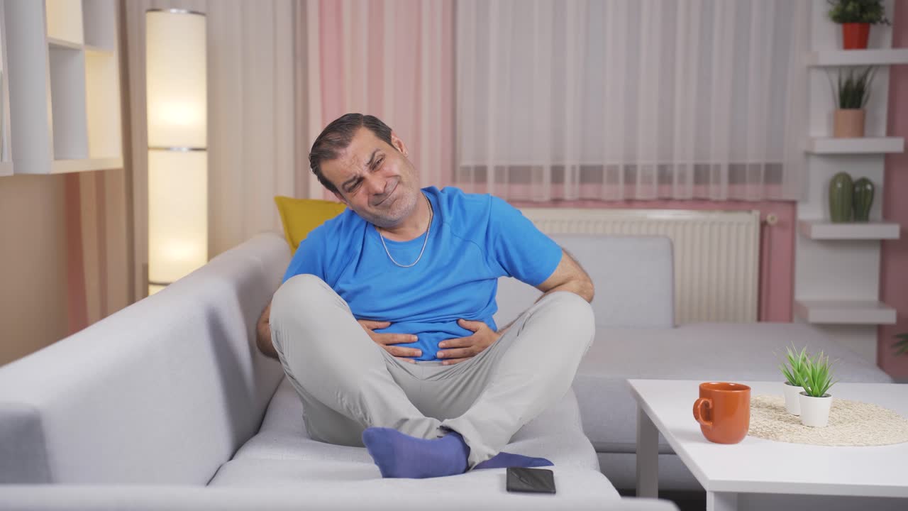 Man with stomachache.
