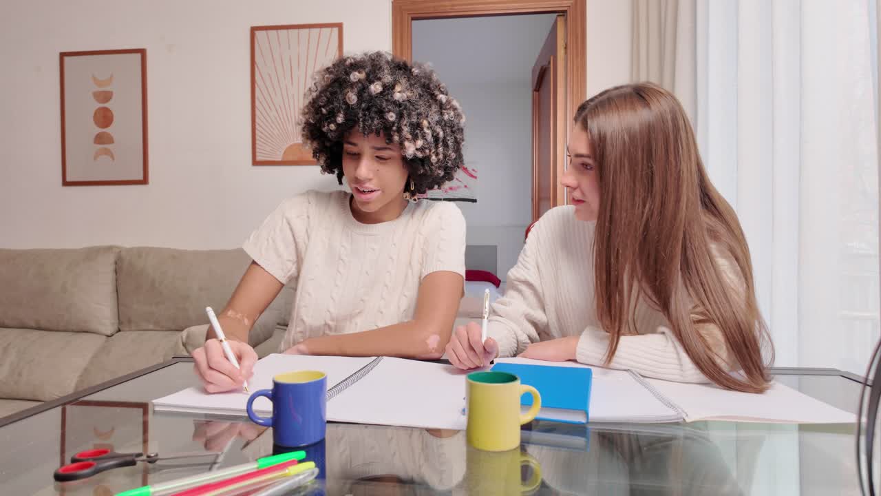 Two people studying at a table