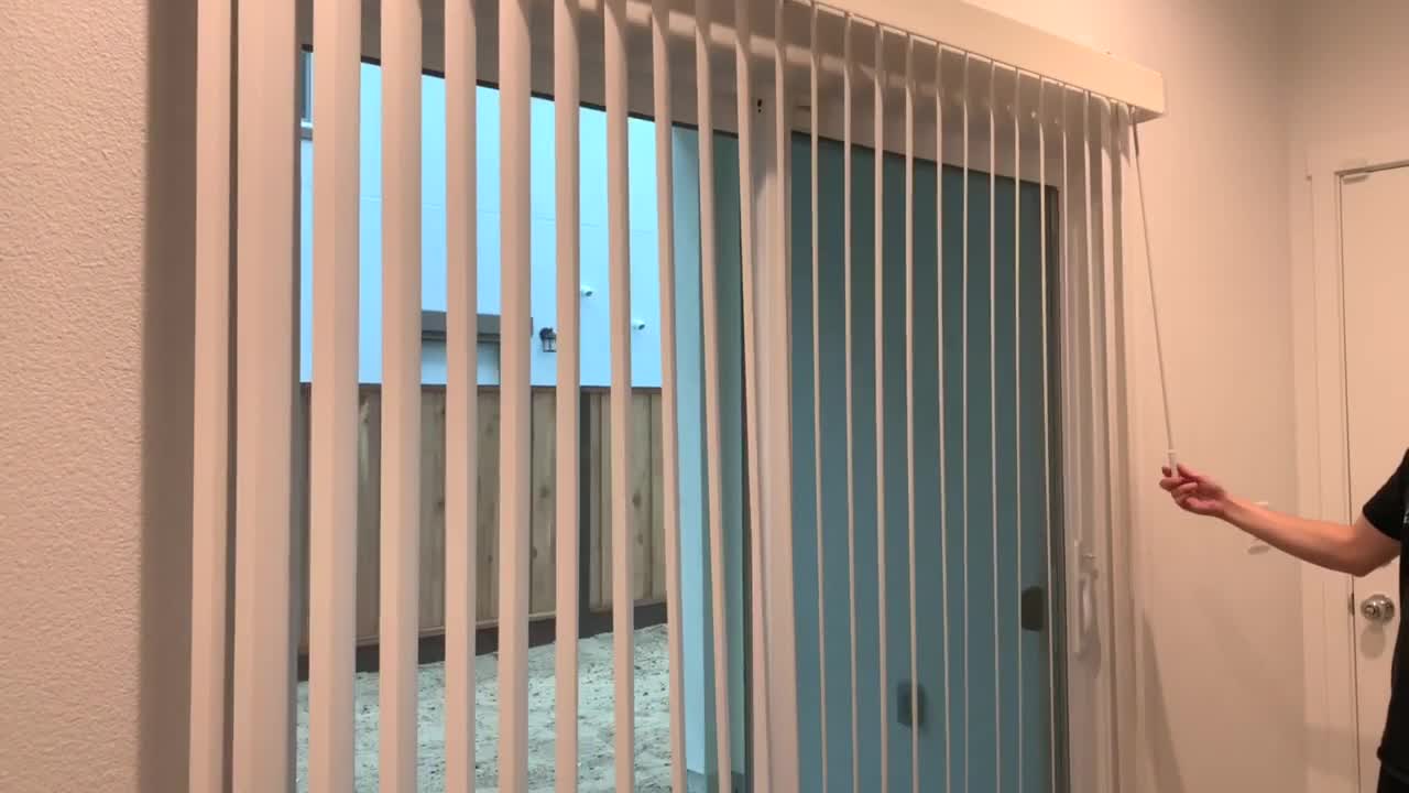 Installing a vertical blind on a sliding glass door for privacy