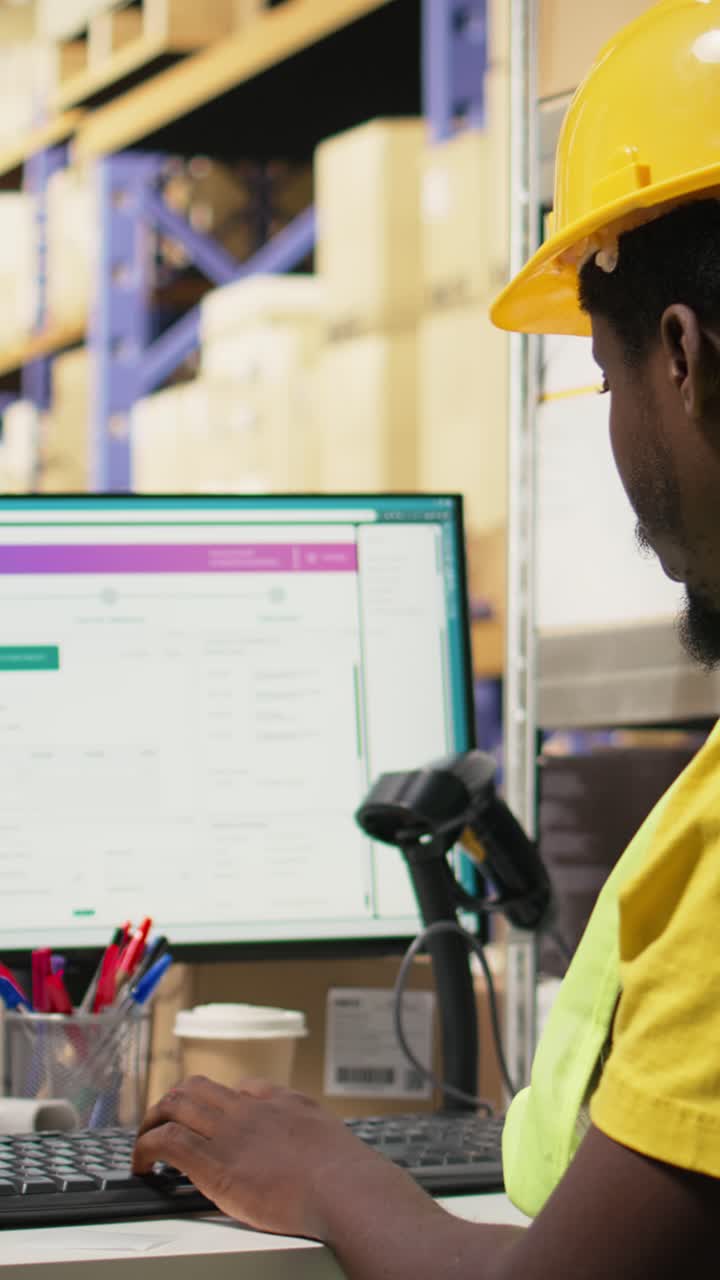 Vertical Video African American worker applying airway bill details and scanning labels