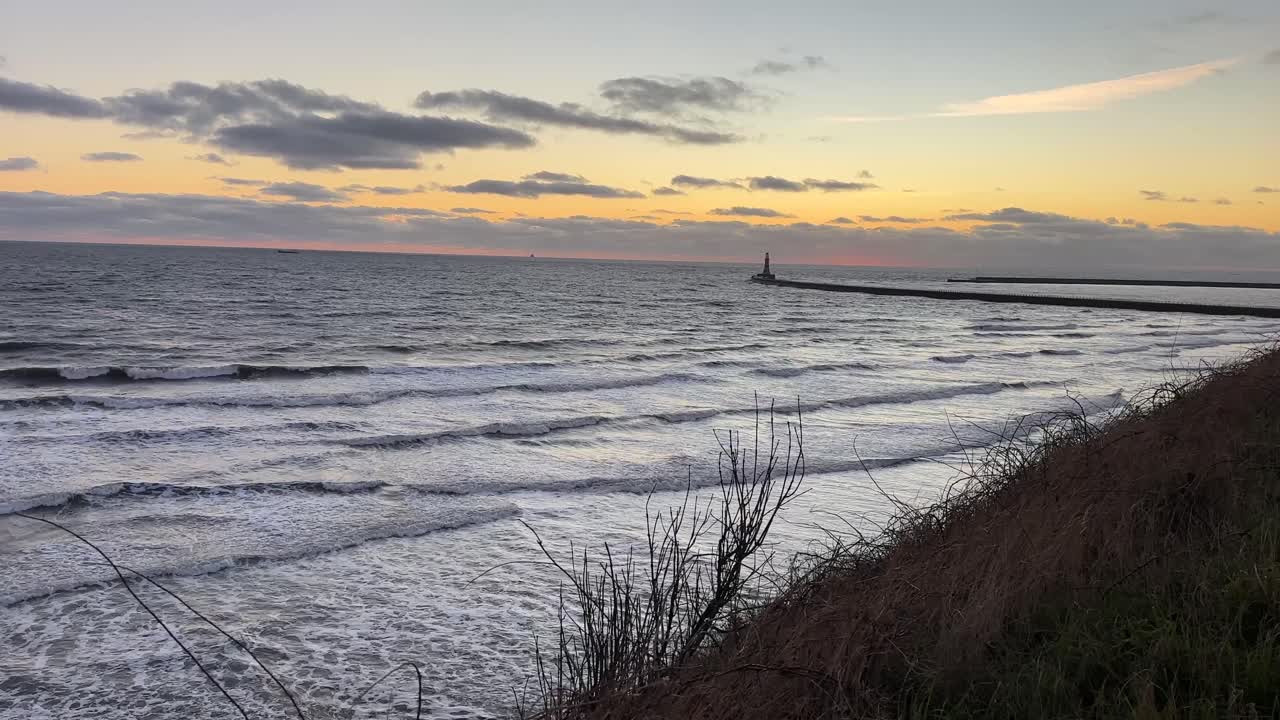 Tidlig morgen solopgang roker mole strand sunderland nordøst england britisk hav uk