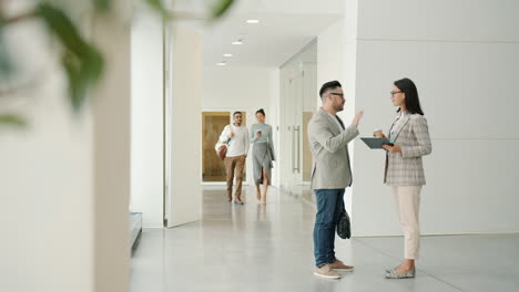 business people in a modern office corridor