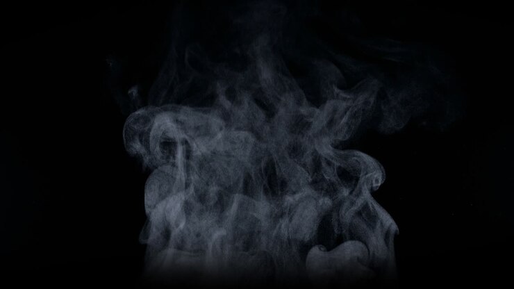 White natural rising steam from food or hot drink isolated on a black background. Сan be used in any projects with hot food. Slow motion, 4K, 300fps, Blackmagic Ursa Pro G2.