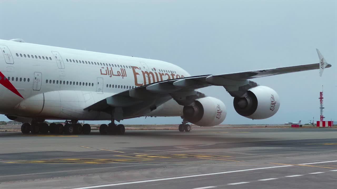Close Up Of Emirates Airbus A380 Taxiing At Nice Cote d'Azur Airport In France. tracking shot