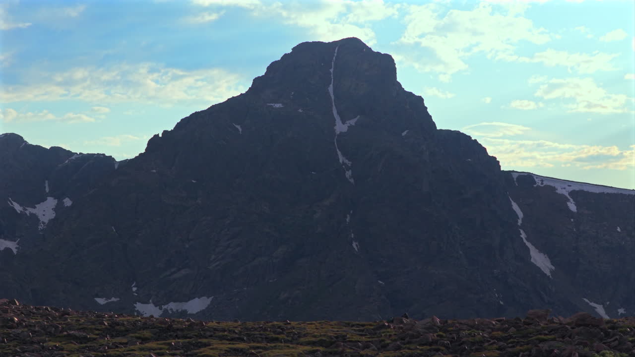 Notch Mountain shelter Halo Ridge landscape view of Mount of the Holy Cross 14er peak wilderness aerial drone Colorado summer afternoon sunset clouds Rocky Mountains Sawatch Range parallax left motion