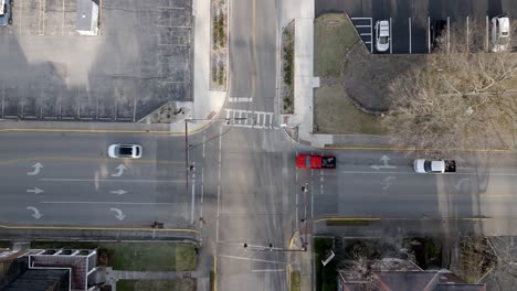 bowling green, kentucky four way intersection with car traffic and drone video overhead