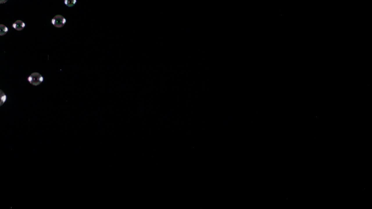 Soup Bubbles Isolated on Black Background