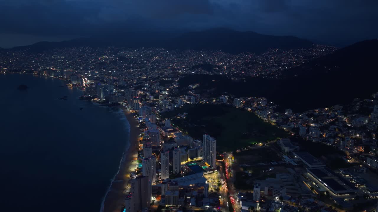 Nighttime drone capture of Acapulco Bay, Mexico
