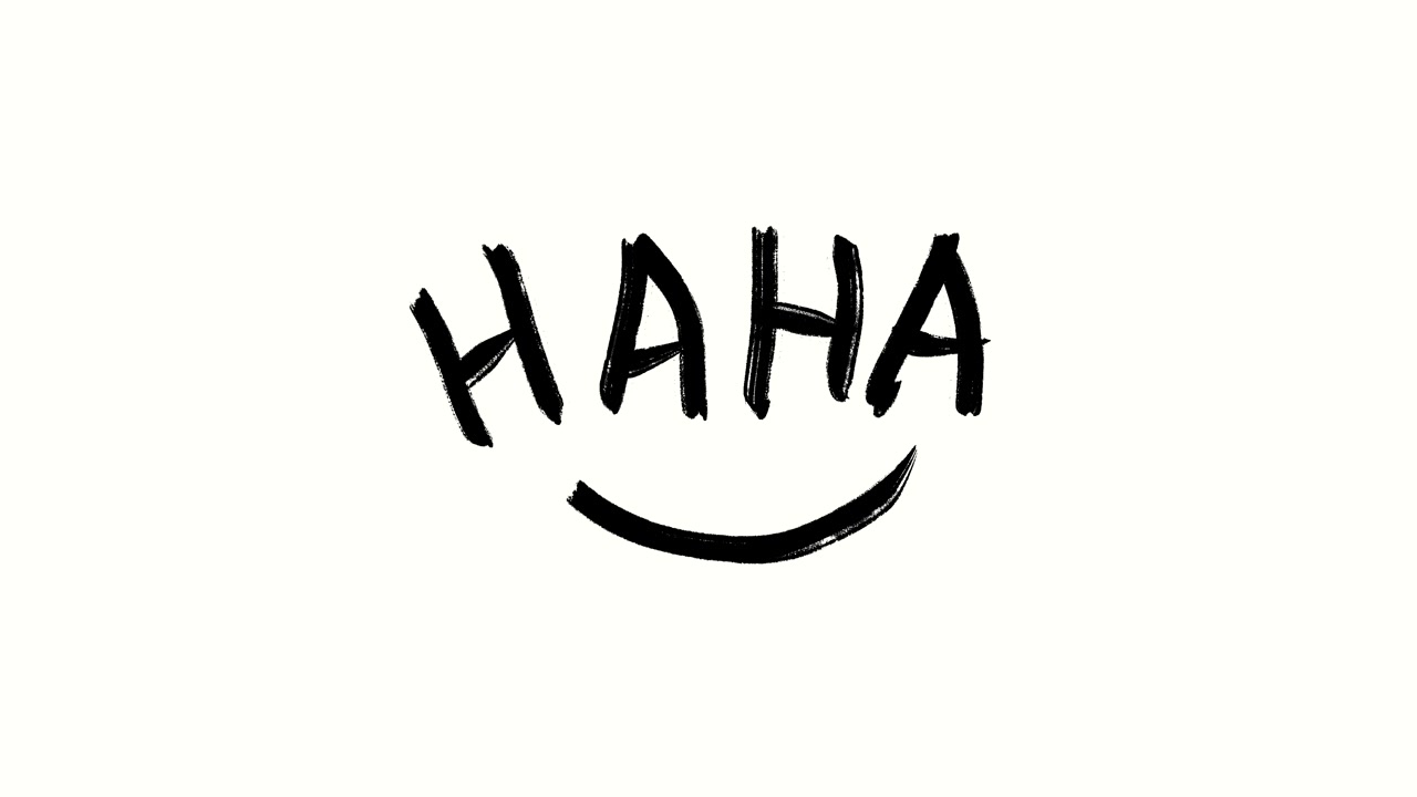 Testo "Haha" scritto a mano con un'icona di bocca sorridente