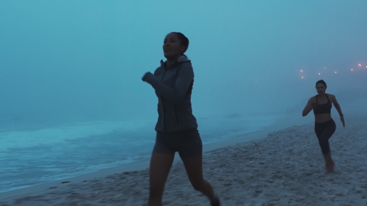 Beach running, race and tired fitness woman by