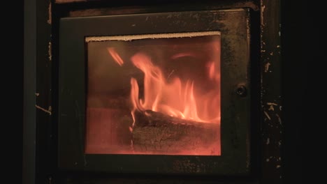 LOCKED-OFF-Wooden-log-burning-in-heating-salamander