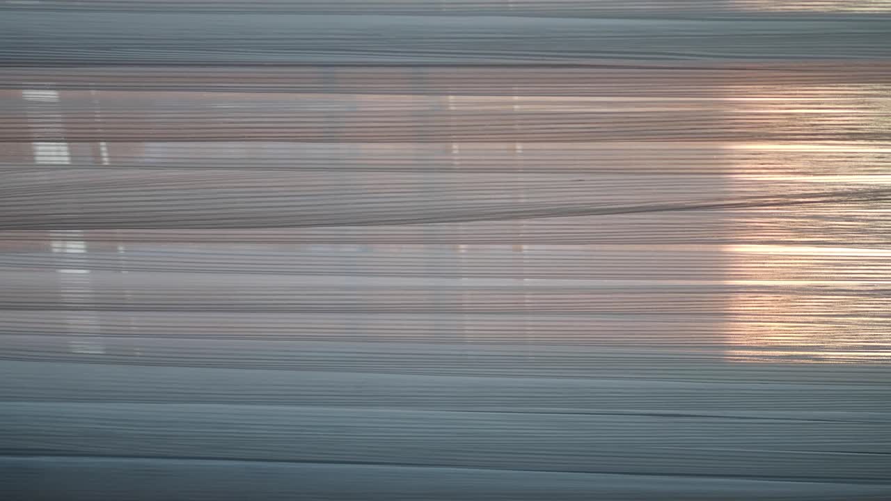 Close-up of Modern Window Blinds with Filtered Light