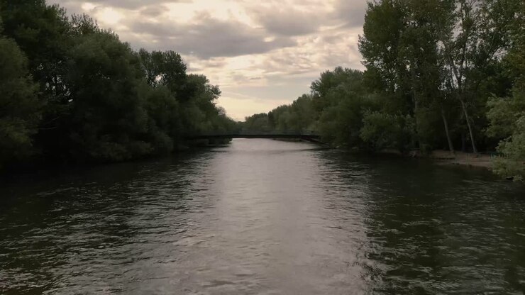Aerial drone shot flying over bridge on Boise River