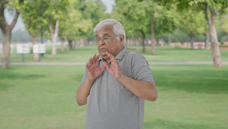 Scared-Indian-old-man-afraid-of-someone-in-park