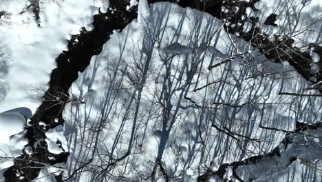 Aerial-establishing-shot-of-Japan-snowy-valley-near-the-Nagano-Myoko-Yamanochi-region