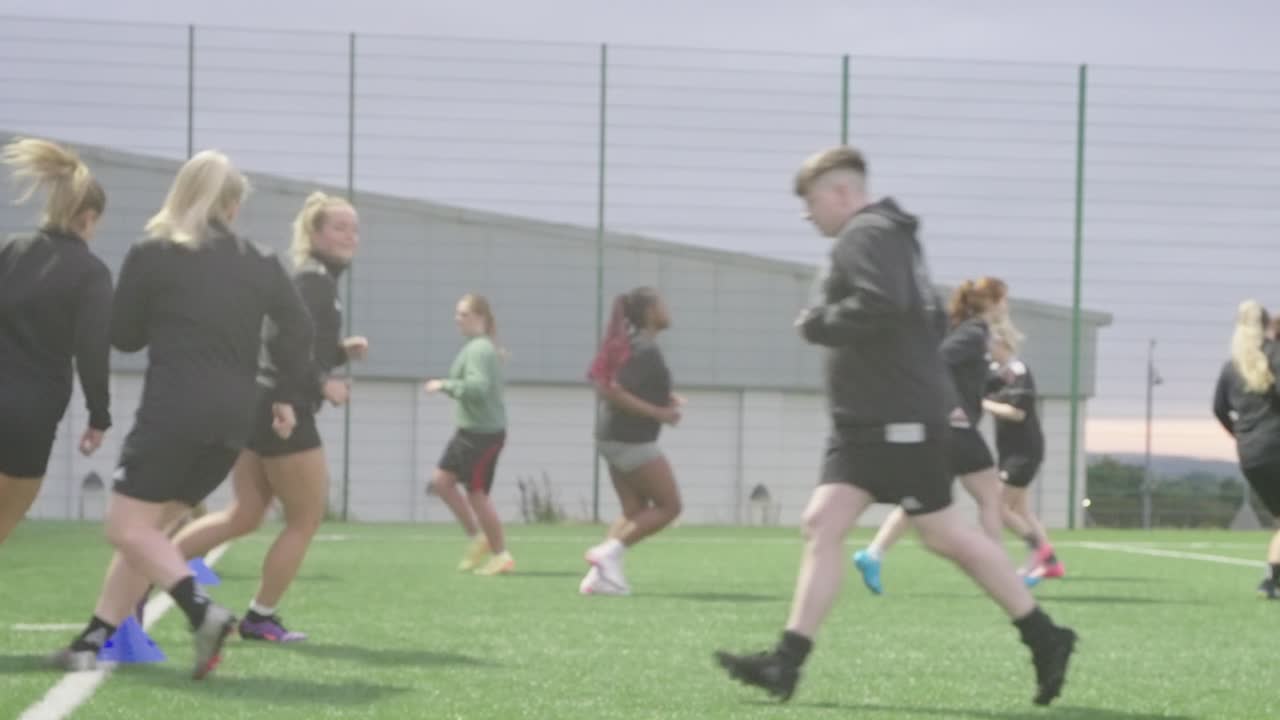 Nighttime soccer practice, fitness training, women’s football team