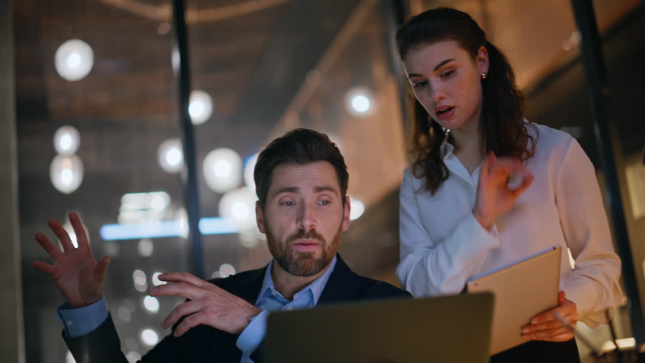 Videocalling partners discussing project at office closeup. Man woman talking