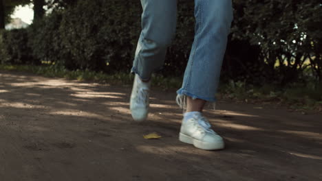 legs of cropped person walking jumping