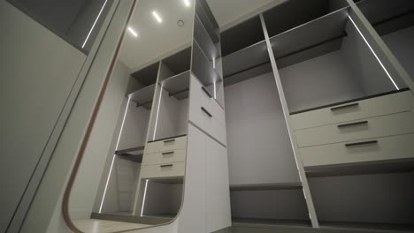 dressing room with shelves. modern wardrobe with bright dressing room