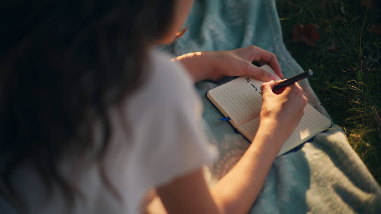 Writing dreams and thoughts during picnic