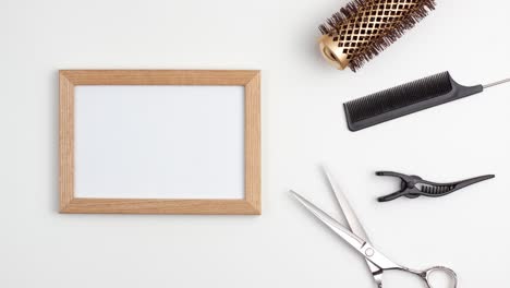 stop motion animation mockup wooden frame of professional hair cutting shears, gold round hair brush for styling, comb for separating hair and section hair clips template. hairdresser salon equipment