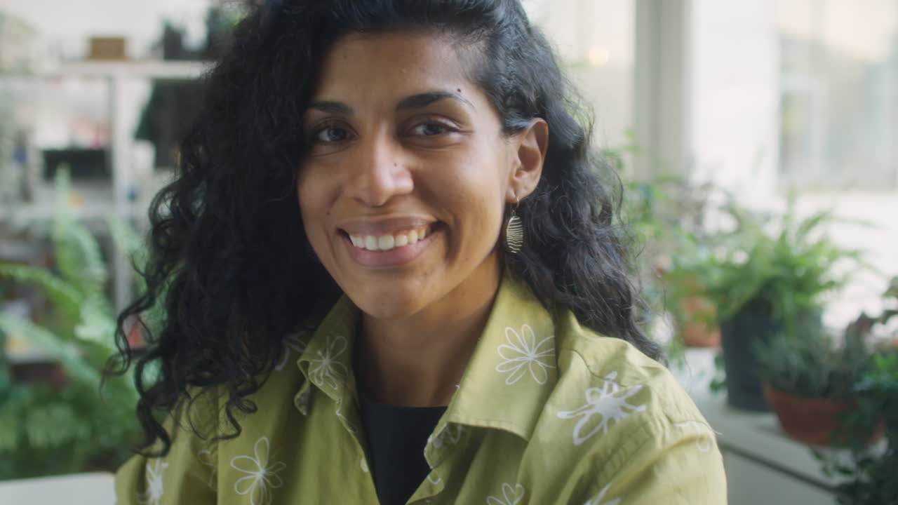 Portrait of Happy Latin Woman in Office
