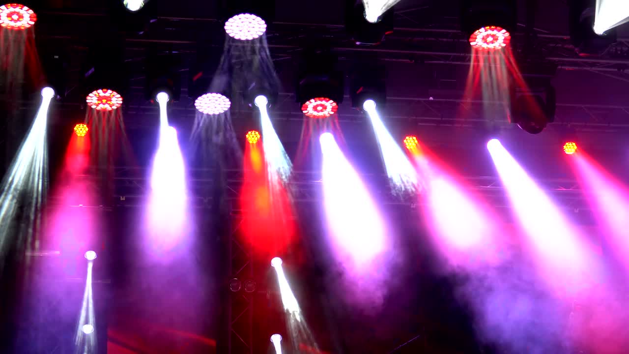 Concert light show, colorful and vivid stage spotlight on stage background