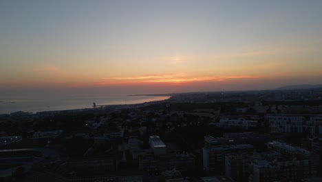 aerial view of spectacular sunset by the ocean in lisbon