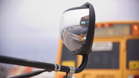 school bus parked in front of a school