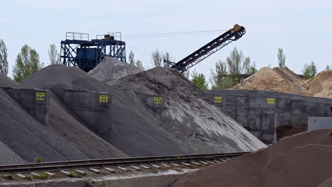 stone crushing equipment. industrial background with working gravel crusher
