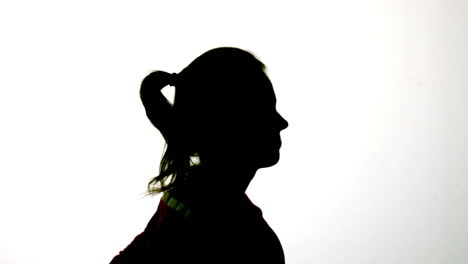 silhouette of attractive woman jogging